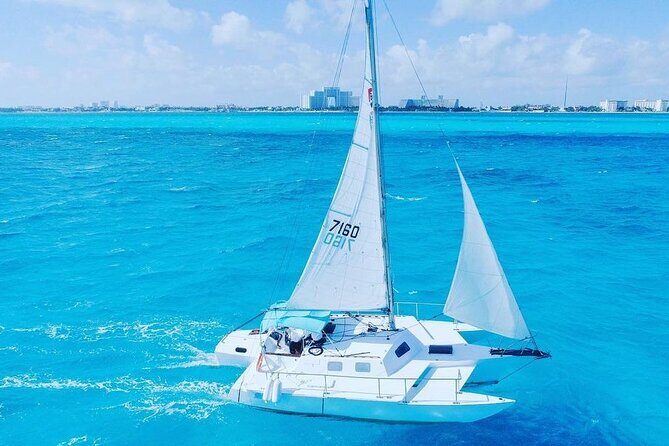 Trip to Isla Mujeres by Catamaran, with snorkeling and drinks - The Stop at Isla Mujeres: Beach, Free Time, and Food