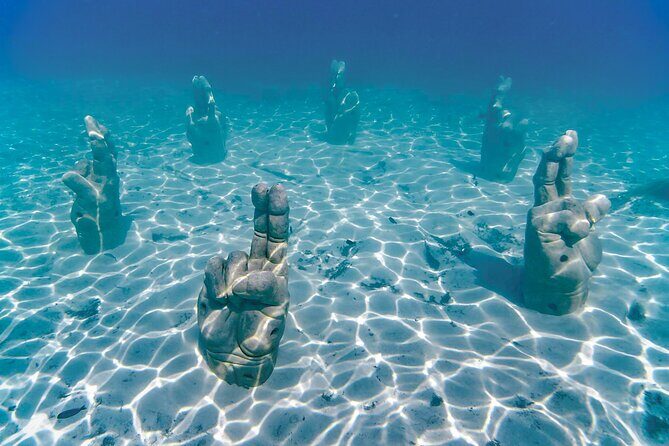 Trip to Isla Mujeres by Catamaran, with snorkeling and drinks - Authentic Traveler Feedback