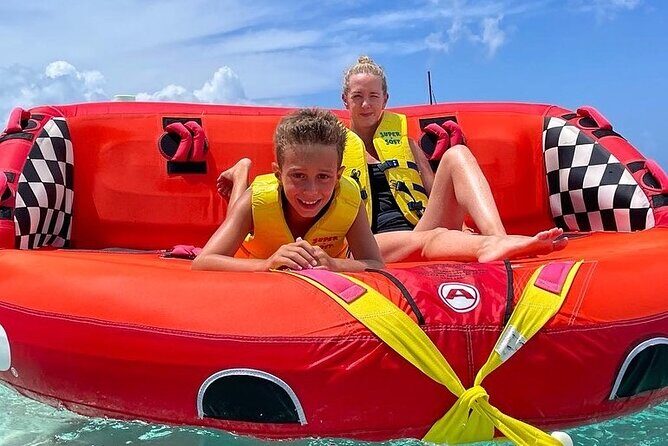 Tubing on grace bay beach Turks and caicos islands - Key Points