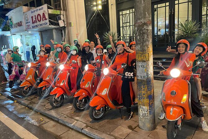 Vespa Female Ao Dai riders Night Street Food + Train Street Tour - Key Points