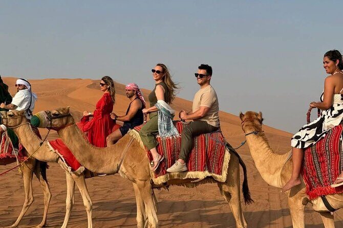 Vip Evening Desert Safari with quad bike,Camel Riding & Dinner - The Sum Up