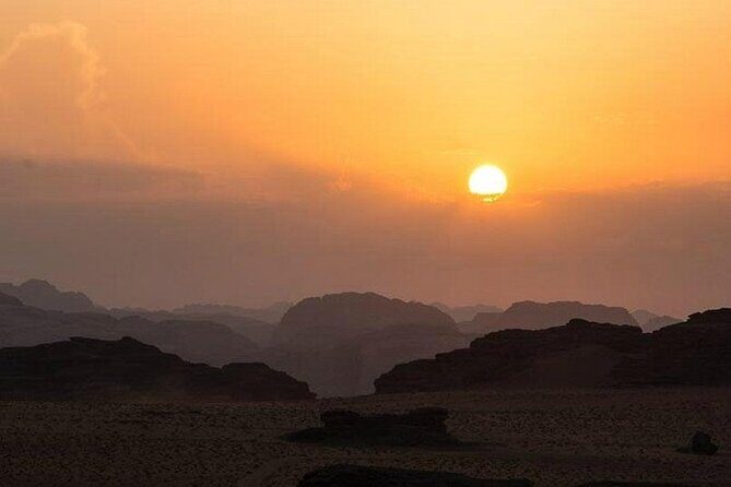 Wadi Rum 4-Hour Sunset Tour - Wadi Rum Desert Highlights - Khazali Canyon: Ancient Carvings and History