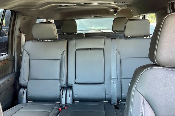 Winery and Vineyard Transportation in Luxury Full Size Black SUV - The Chauffeur and Personalization