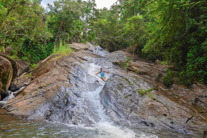 Yunque Rainforest River Rope Swing with Waterslide and Beach Tour - Discover Puerto Rico’s Hidden Natural Treasures: The Yunque Rainforest River Rope Swing with Waterslide and Beach Tour
