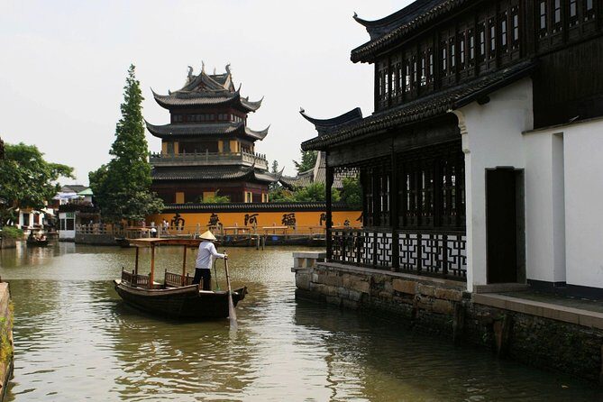 Zhujiajiao Private Day Tour and Shanghai Acrobatic Show - Exploring Zhujiajiao: Water Town Charm and Scenic Sights