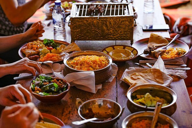 Abu Dhabi: Desert Safari with BBQ, Camel Ride & Sandboarding - The Sum Up