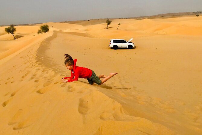 Abu Dhabi Morning Desert Safari,Dune Bashing,Sandboarding,Camel Riding&Quad Bike - The Sum Up