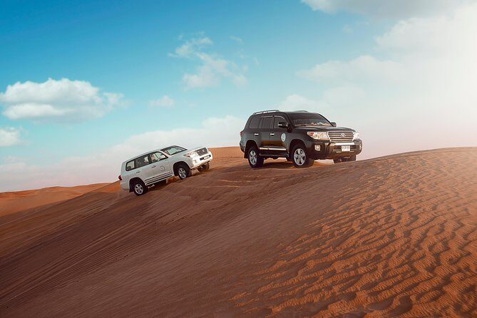 Desert Safari Dubai with Dune Bashing, Sandboarding, Camel Ride, 5 Shows, Dinner - The Sum Up