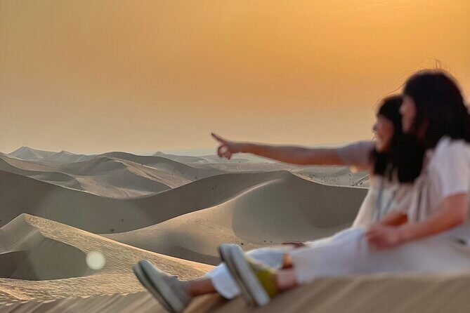 Desert Safari with Dune Bashing and Camel Ride plus Sand Boarding - First Stop: The Camel Farm and Dune Bashing