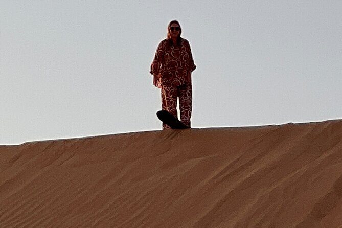 Desert Safari with Dune Bashing and Camel Ride plus Sand Boarding - The Sunset and Photo Moments