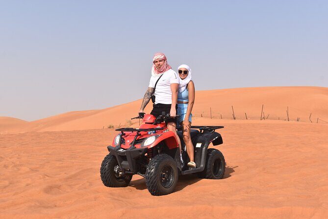 Sunset Desert Safari Quad bike Camel ride Sand Board & BBQ Dinner - Key Points