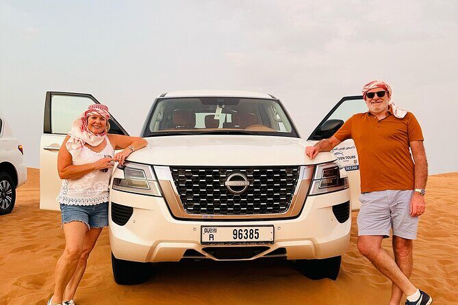 Sunset Desert safari with Camel Ride Sand Board & BBQ Dinner - Key Points